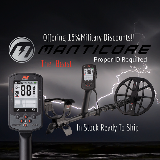 MINELAB Manticore High Power Metal Detector set including the detector device, an 11-inch round double-D coil, a large LCD control box, and a pair of wireless headphones.
