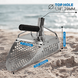 Metal spade with measurements on a beach background