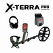 Metal detector with headphones and pouch on a white background, featuring X-Terra Pro branding.